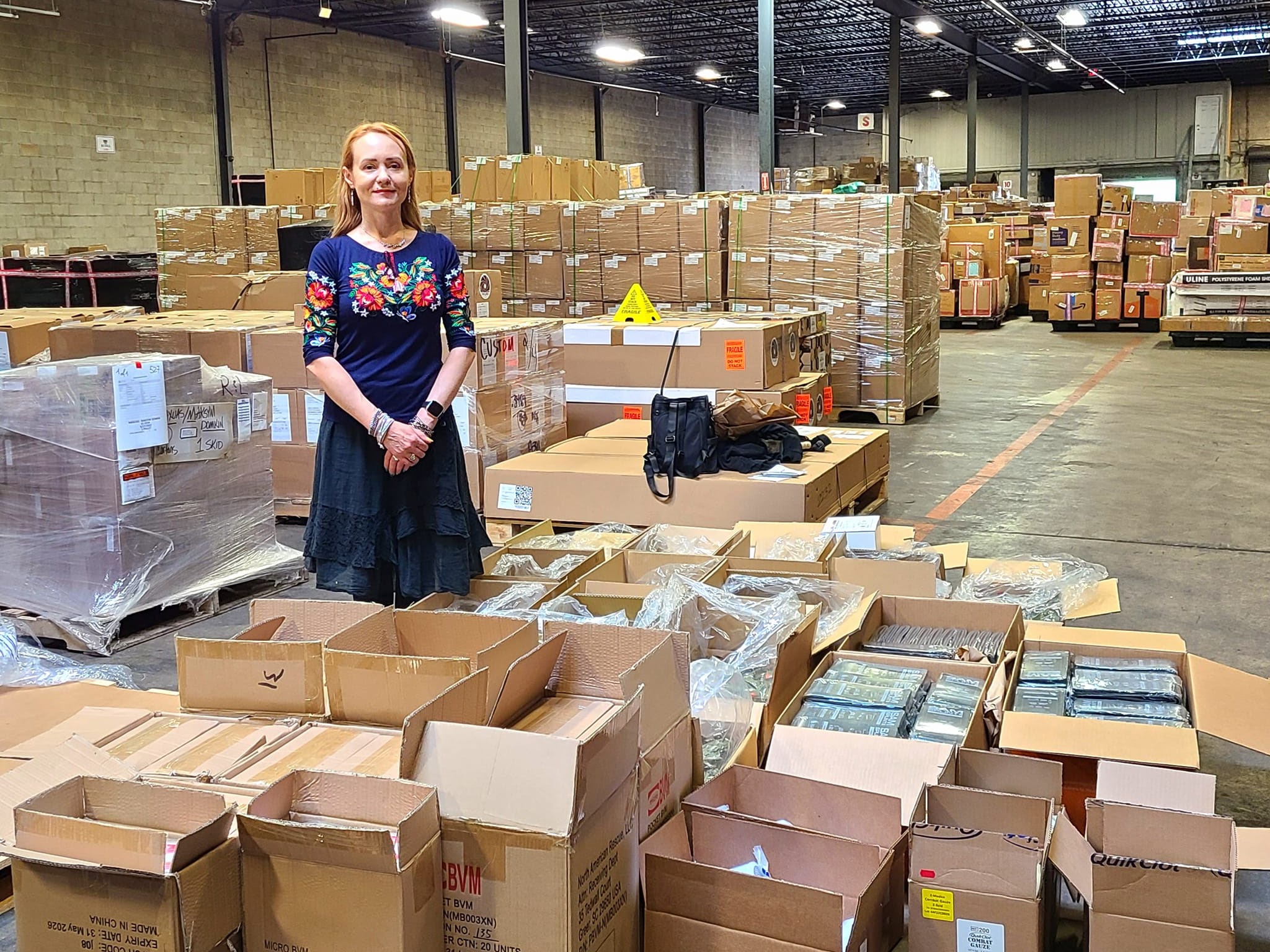 USUA's president, Nadiya Shaporynska, displays humanitarian and medical aid about to be shipped from the US to Ukraine